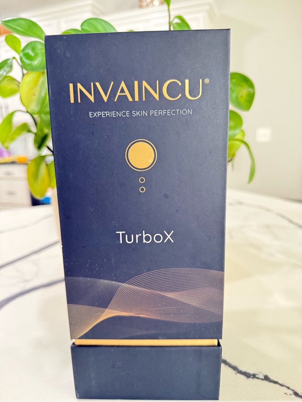 TurboX Facial Skincare Device - Navy & Gold